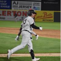 Donny Sands of the Somerset Patriots reacts after his walk-off home run