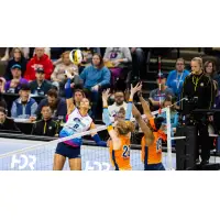 Omaha Supernovas outside hitter Reagan Cooper (left)